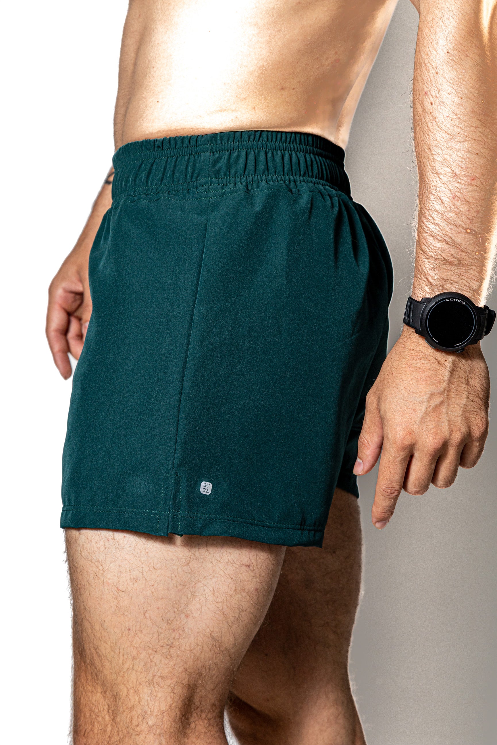 SHORT VERDE OSCURO DE COMPETENCIA PARA HOMBRE Y MUJER