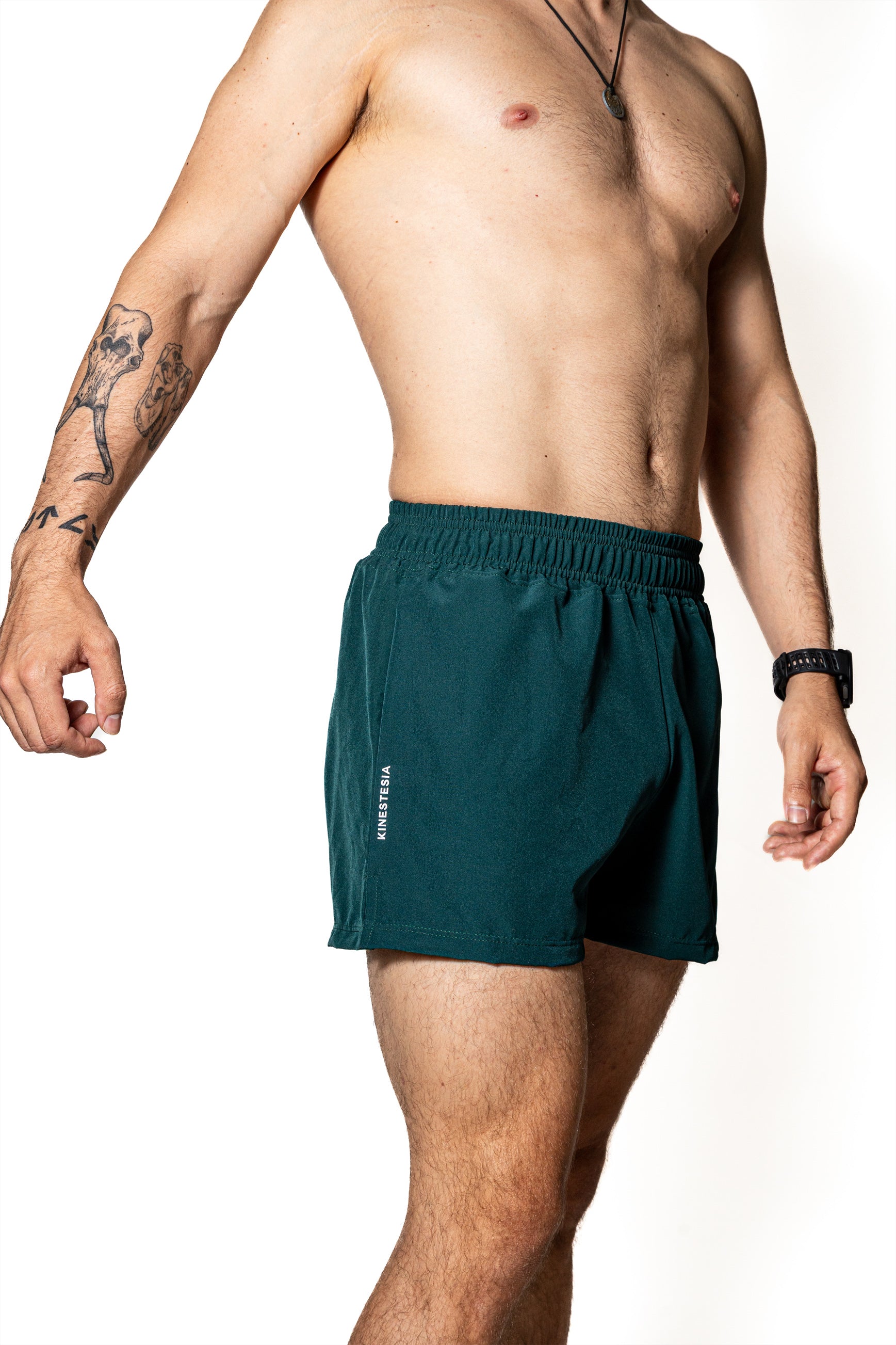 SHORT VERDE OSCURO DE COMPETENCIA PARA HOMBRE Y MUJER