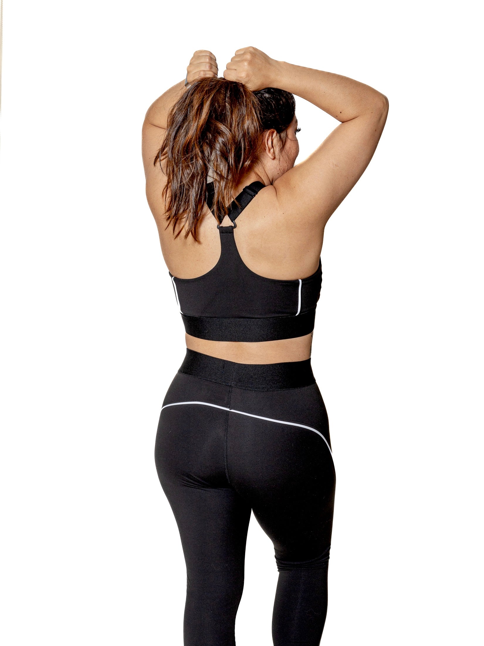 SET TOP Y LEGGING NEGRO CON LÍNEAS BLANCAS DE MUJER