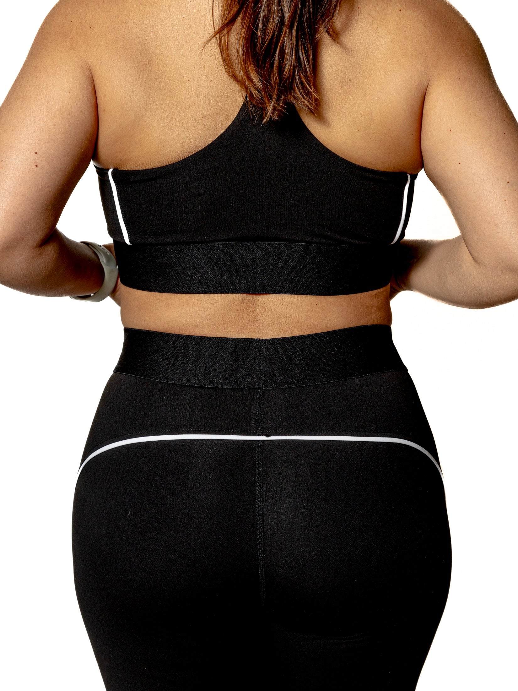 SET TOP Y LEGGING NEGRO CON LÍNEAS BLANCAS DE MUJER