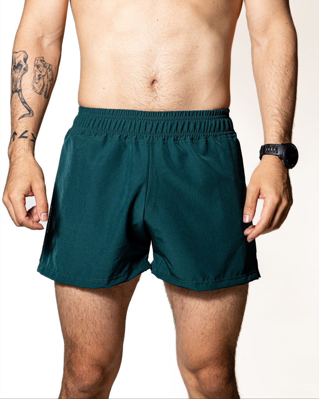 SHORT VERDE OSCURO DE COMPETENCIA PARA HOMBRE Y MUJER