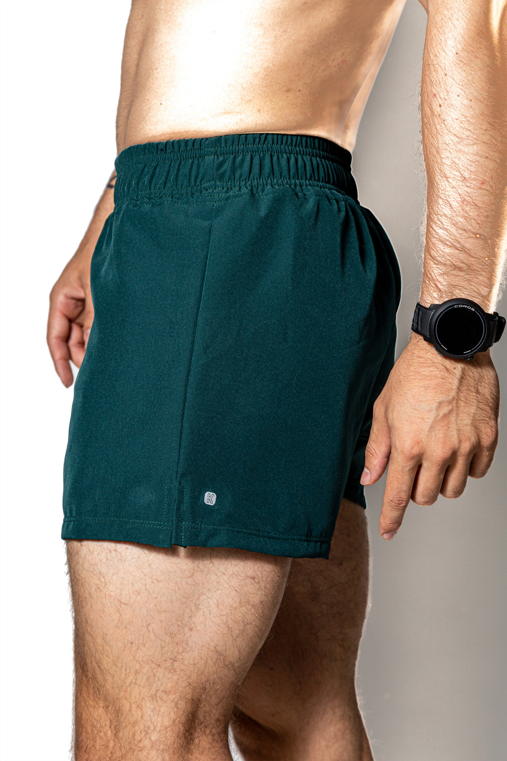 SHORT VERDE OSCURO DE COMPETENCIA PARA HOMBRE Y MUJER