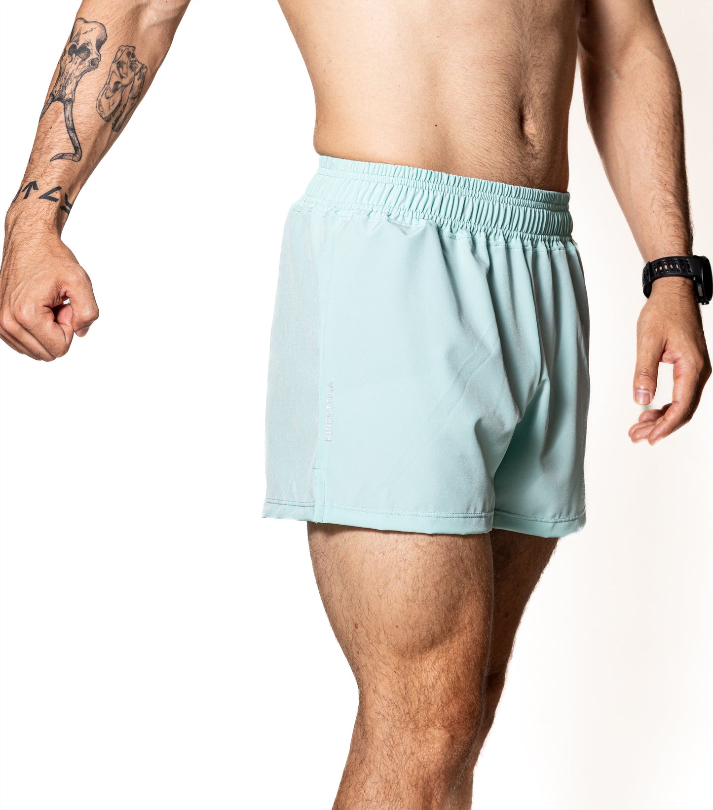 SHORT VERDE PISTACHE DE COMPETENCIA PARA HOMBRE Y MUJER