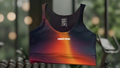 TOP DEPORTIVO MUJER NEGRO NARANJA DEGRADADO